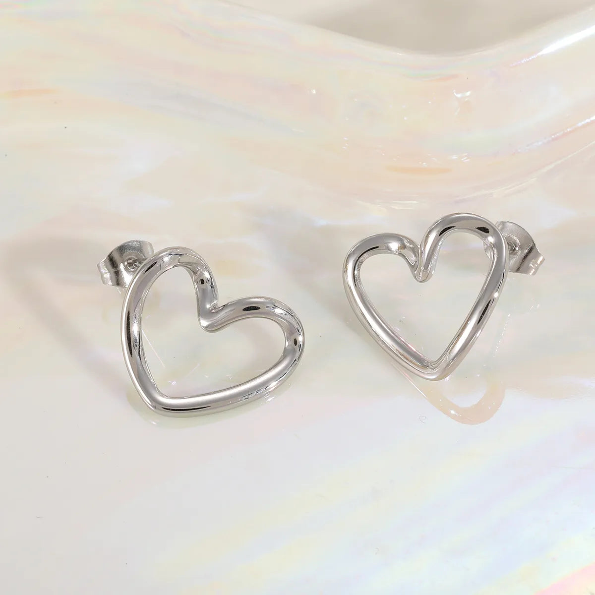 Twisted Heart Silver Earrings