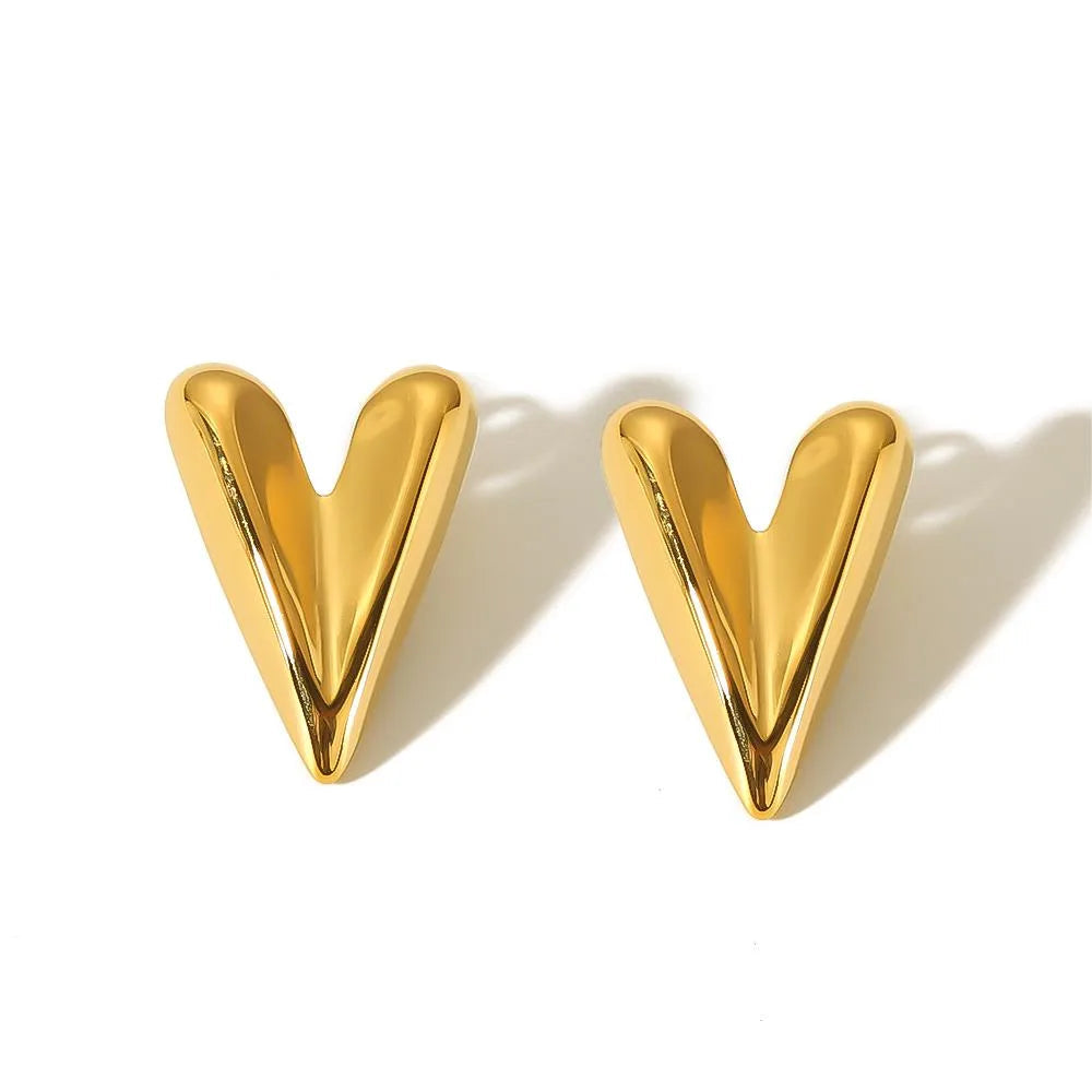 Teddy Gold Drama Heart Earrings