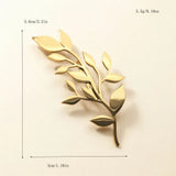 Glossy Gold Brooches